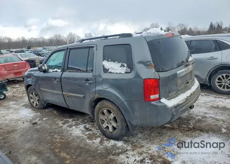 2011 Honda Pilot Touring z USA, uszkodzony, nr VIN 5FNYF4H9XBB067379
